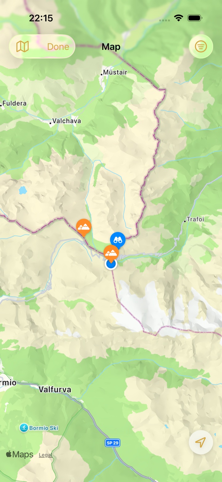 The map around Passo dello Stelvio with orange markers for unvisited passes, a blue place pin and the Map Options button